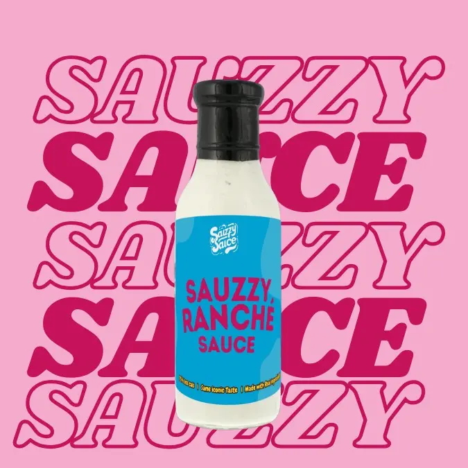 A image of a bottle of Sauzzy Ranche Sauce- the best low calorie ranch dressing/ sauce- that has the same iconic taste and is made with high quality ingredients. Its packaged in Sauzzy Sauces eco-friendly 100% recycled glass bottles and packaging and is being shown against a background 'Sauzzy Sauce'